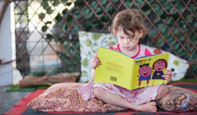 Girl-reading-book-HIPPY-program