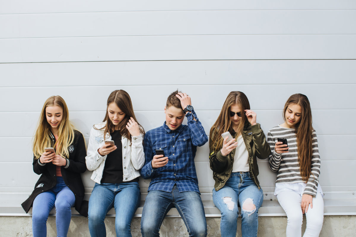 teenagers on phones